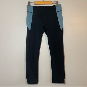 Under Armour black and blue leggings with mesh detailing